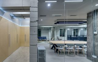 Office with exposed walls and block work