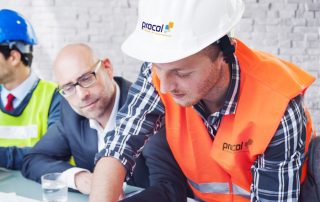Procol M&E installation engineer disucssing a project